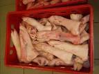 FROZEN PORK FEET FRONT AND HIND.