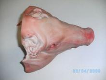 Piglet heads in cartons