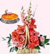 1/2 Kg Cake & 12 Carnation in Basket