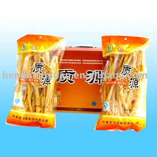 Yellow dried bean curd stick made by yellow bean for frying when it is soft in water