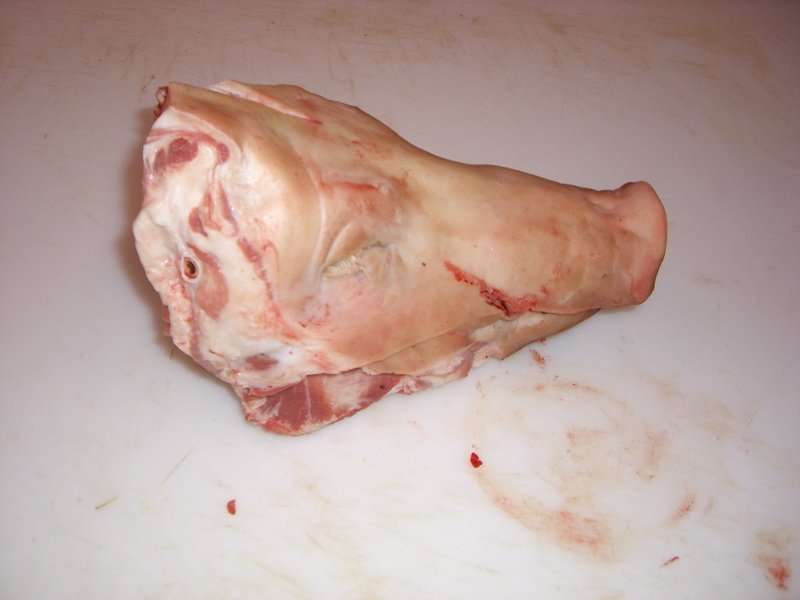  PORK   HEADS  (BONE IN) IN CARTONS