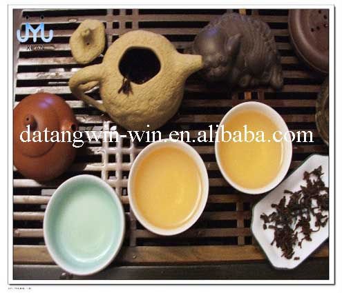woman favored  Lapsang Souchong Black Tea