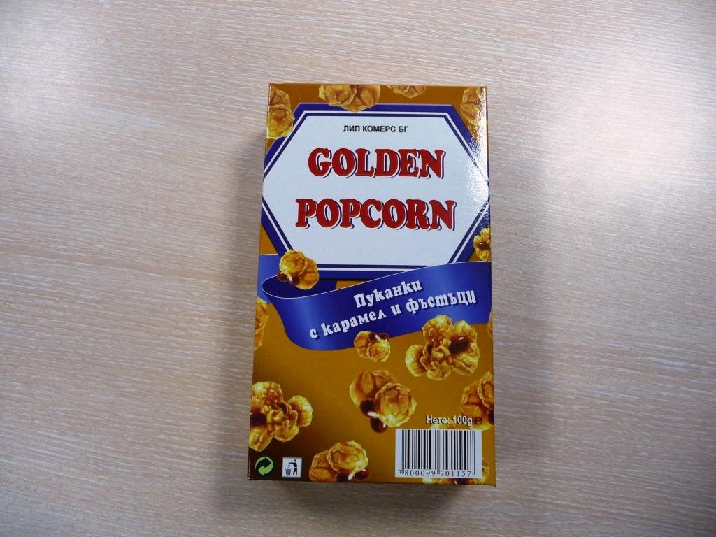 ready made pop  corn  with caramel and  nuts 