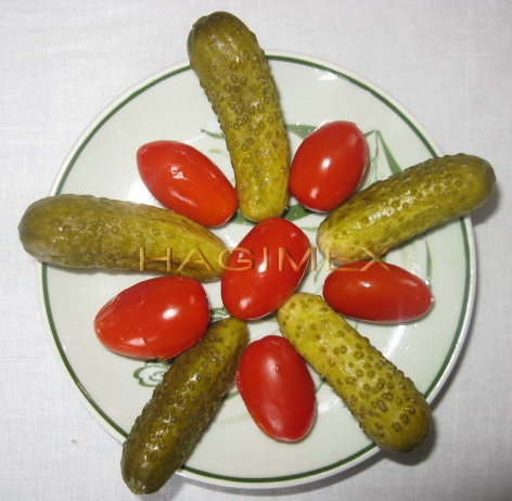 Cherry tomatoes and  cucumber  in  brine 