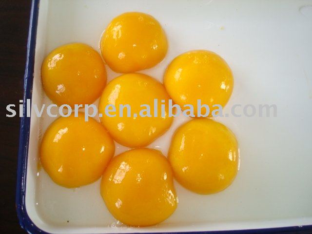 Halve peach in heavy syrup