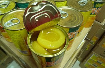 canned fruit( yellow   peach  in  tin s)