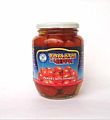 Pickled tomato in glass jar