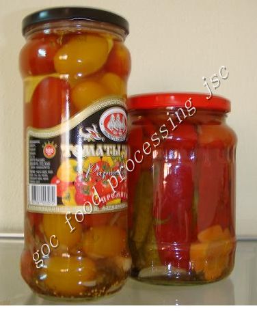Yellow tomato cherry in jars