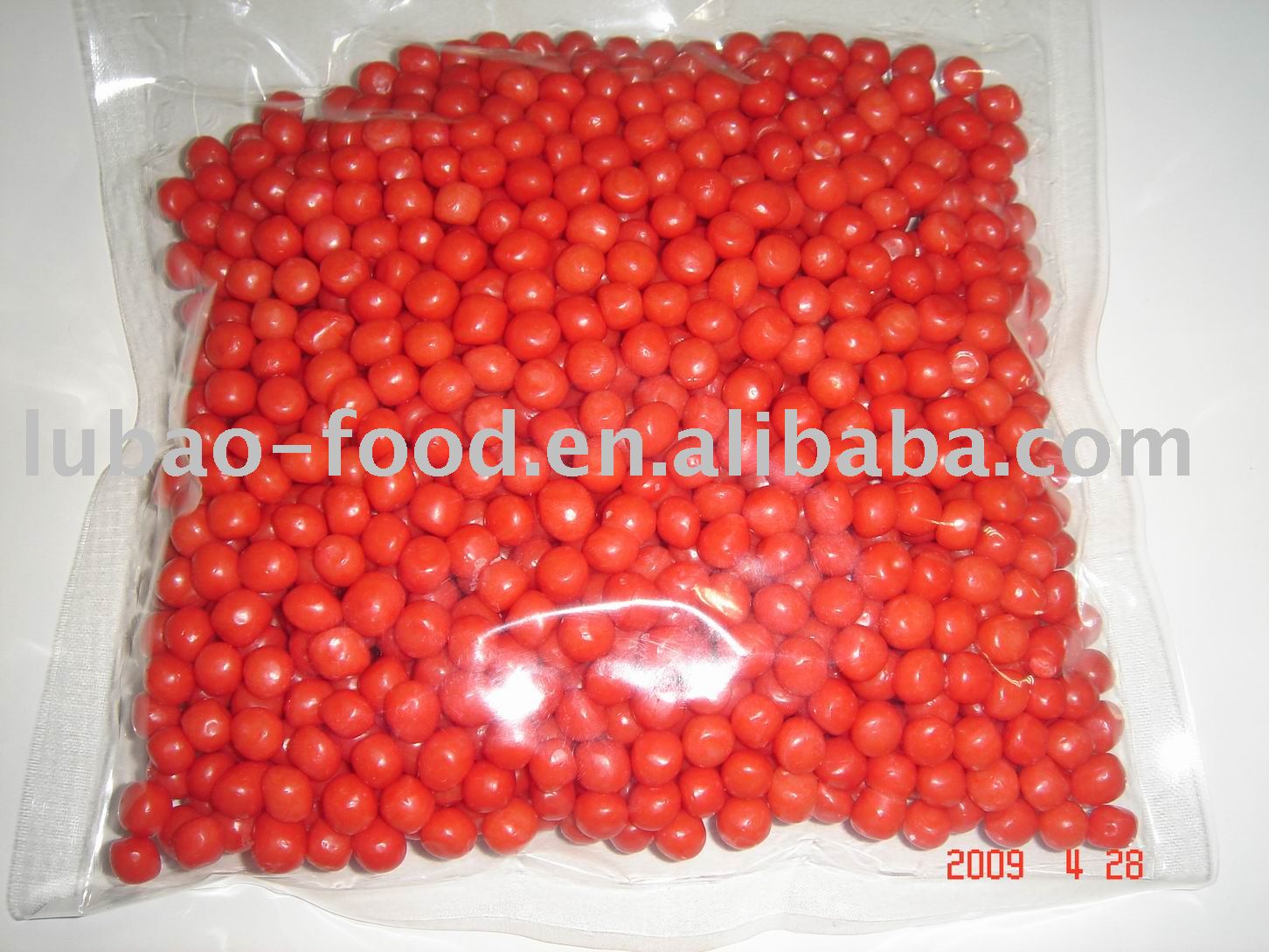 Hard candy coated with Strawberry flavor milk chocolate