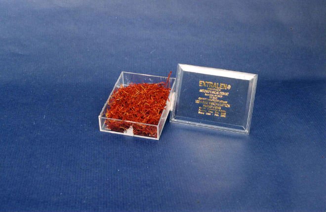 Saffron in transparent plastic boxes of different weight