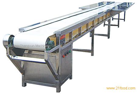 Flat conveyor with worktable