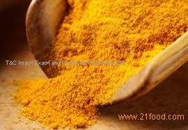 Sliced dried tumeric and tumeric powder