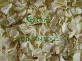 Dehydrated white onion flakes