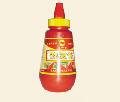 red bottle and hot chili sauce
