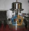 Bottle filling machine with double head