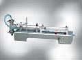 Semi-automatic liquid filling machine