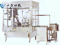 FULL AUTOMATIC GLASS BOTTLE FILLING AND SEALING MACHINE