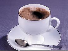 Non dairy creamer into coffee