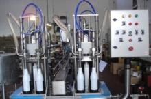 Bottle filling & sealing machine