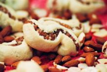 Mustaccioli pastries filled with figs preserve and roasted almonds