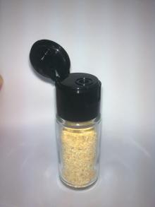 Vietnam spice in small jar, bottle: pepper, chili, garlic, cinnamon, turmeric, basil, oregano