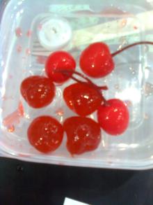 canned cherry in syrup or  maraschino  cherry