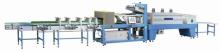 Shrink wrapping machine