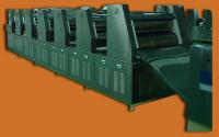 Continuous tablet pressing machine