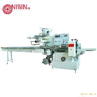 Automatic shrink packaging machine