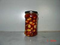  Garlic  in  oil  with tomato/pepper paste