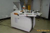Continuous  Dough   Divider  and  Rounder 