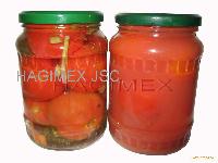 Picked tomato in jars.