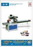 Automatic horizontal  flow  wrap  machine  to  pack  biscuits, soaps, stationary items etc. (Model LX-141)
