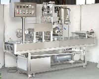 SS-12 CONTINUE AUTO. CUP/TRAY SEALING MACHINE