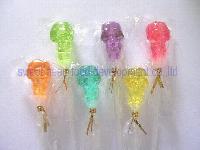 Human skeleton head lollipop candy