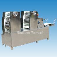 215 Primary flaking machine